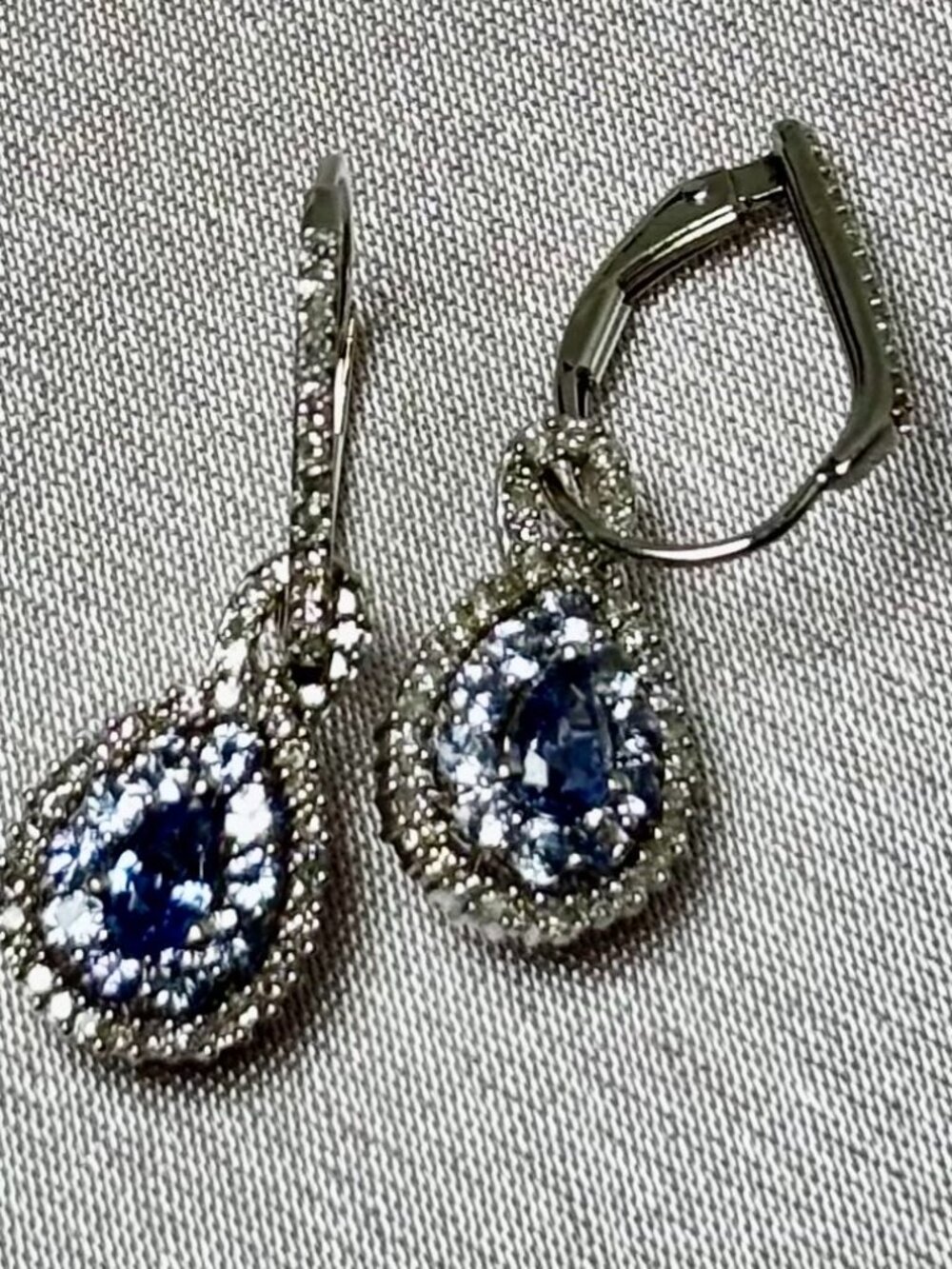 Tanzanite pear shape and Diamond halo style 14k white gold earring